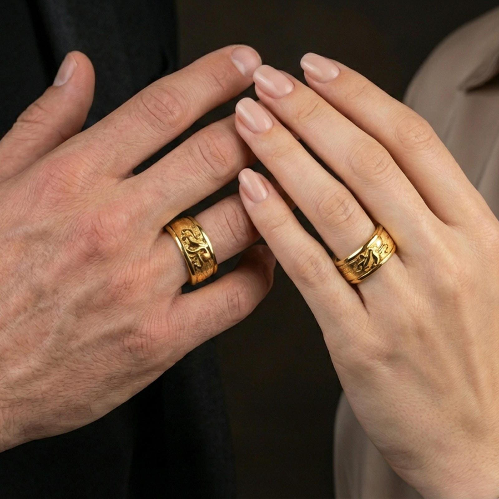 Gold plated octopus spinner band worn on finger, detailed octopus motif on rotating band, premium lifestyle jewelry photo.