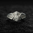 Load image into Gallery viewer, Polished silver Saint Jude religious signet ring on black volcanic stone, crisp saint portrait relief with engraved “God Bless” and “Save Us” text, centered close-up studio lighting.
