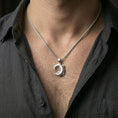 Load image into Gallery viewer, Polished silver alligator necklace worn on the neck in a close lifestyle frame, highlighting the detailed scale texture and realistic animal form
