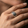 Load image into Gallery viewer, Polished silver geometric square-grid band worn on finger, clean bright finish with sharp texture definition, daily wear photo.

