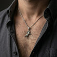 Load image into Gallery viewer, Oxidized horse pendant with rearing stallion design worn on the neck in a lifestyle jewelry shot, styled against the chest for a bold and elegant equestrian look
