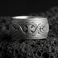 Load image into Gallery viewer, Oxidized sterling silver Celtic knot ring with iron cross centerpiece on black volcanic stone, darkened recessed details for a bold medieval look.
