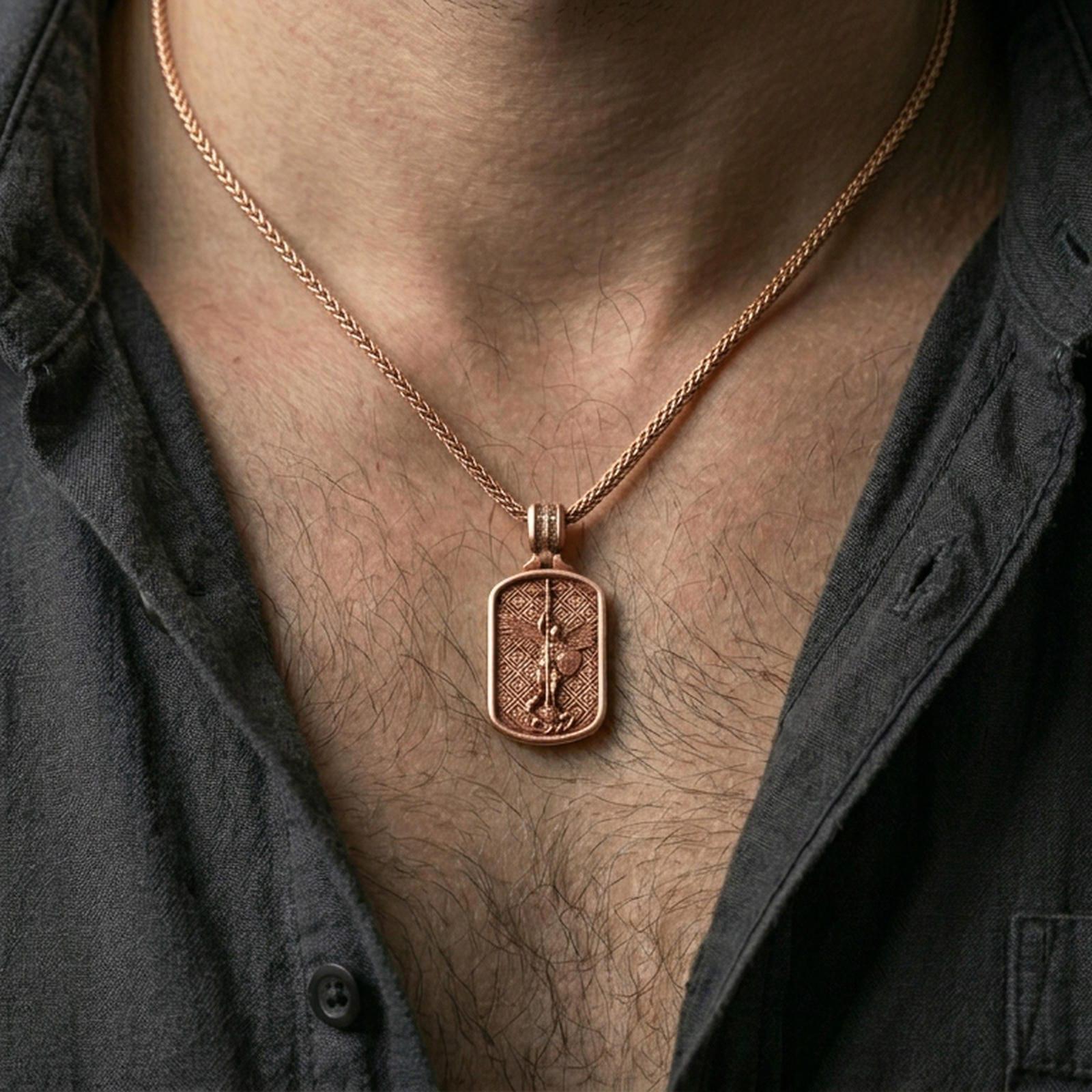 Saint Michael dog tag necklace worn on the neck in a lifestyle shot, showing the pendant’s full silhouette and chain pairing.