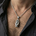 Load image into Gallery viewer, Close-up of the Buddha hand pendant on a model’s neck, highlighting the calm facial expression and lotus detailing.
