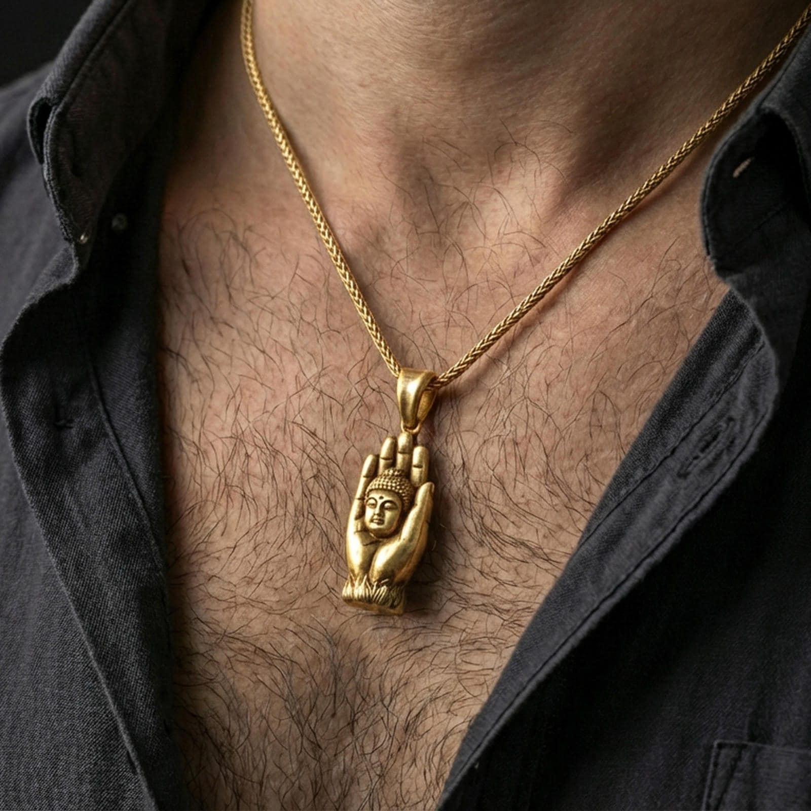 Buddha in protective palm pendant worn on the neck, angled view showing thickness, bail size, and premium craftsmanship.