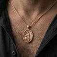 Load image into Gallery viewer, Rose gold plated religious angel pendant worn on the neck in a refined lifestyle shot with a warm and graceful presentation
