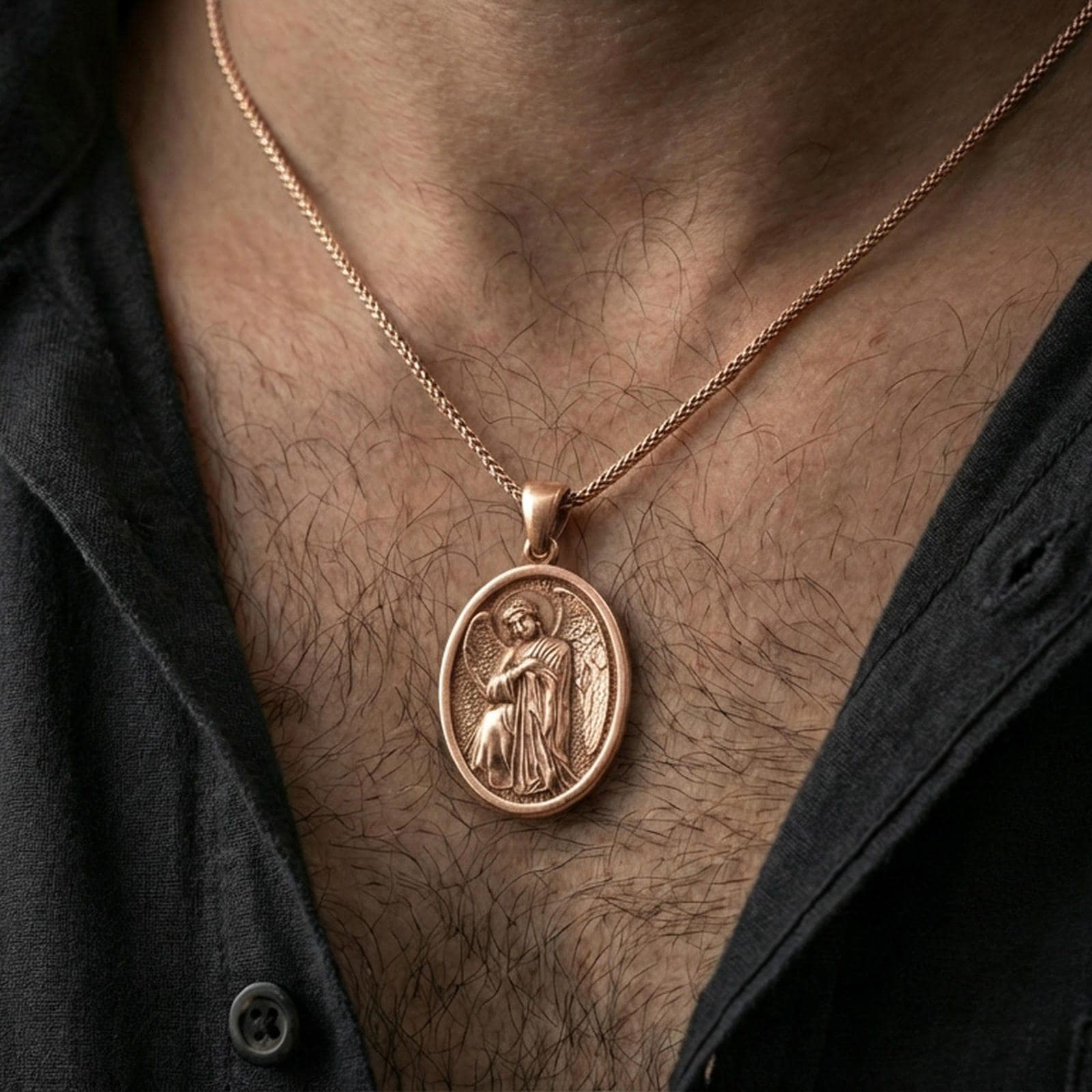 Rose gold plated religious angel pendant worn on the neck in a refined lifestyle shot with a warm and graceful presentation