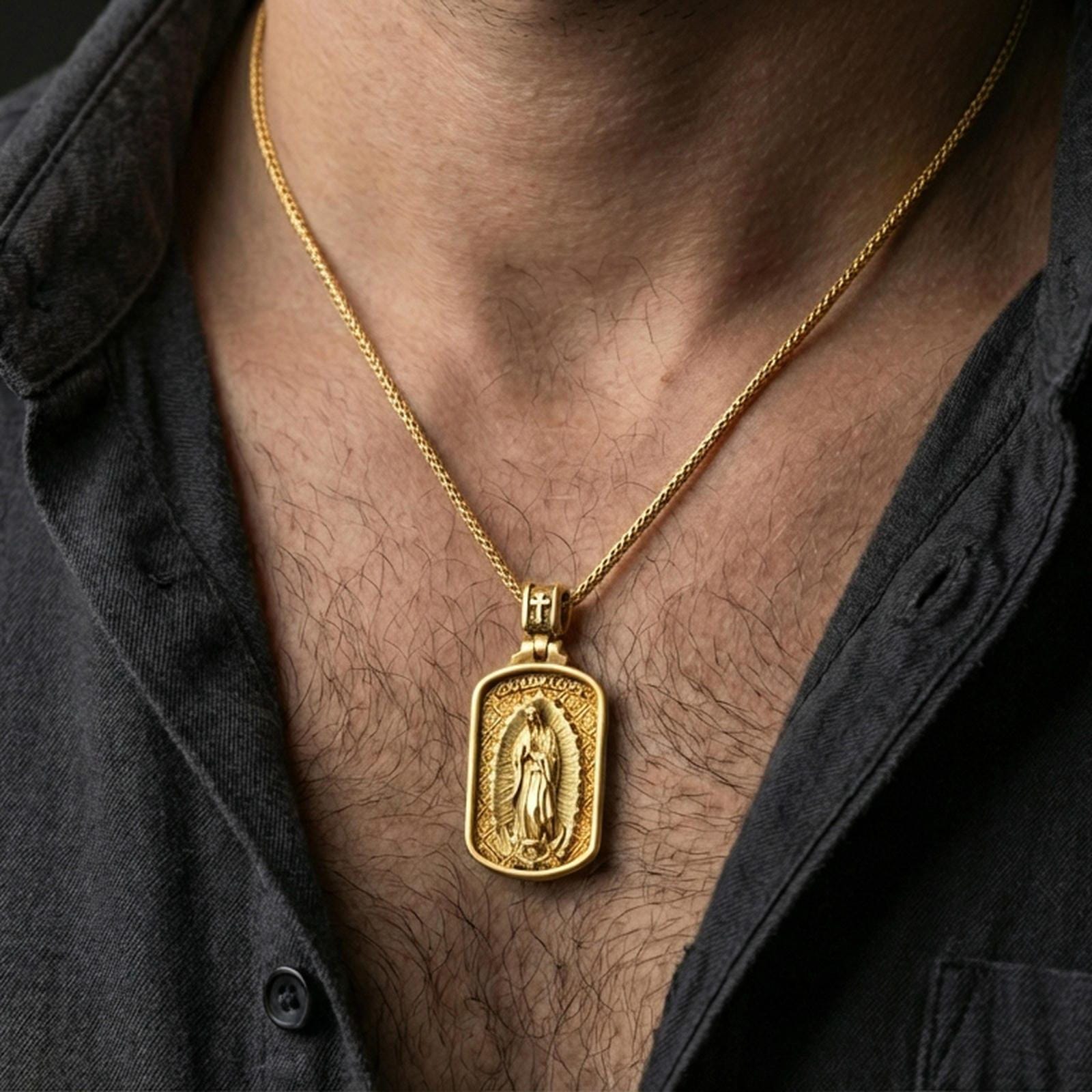 Gold plated Our Lady of Guadalupe pendant worn on the neck in a premium lifestyle composition with classic Christian jewelry styling
