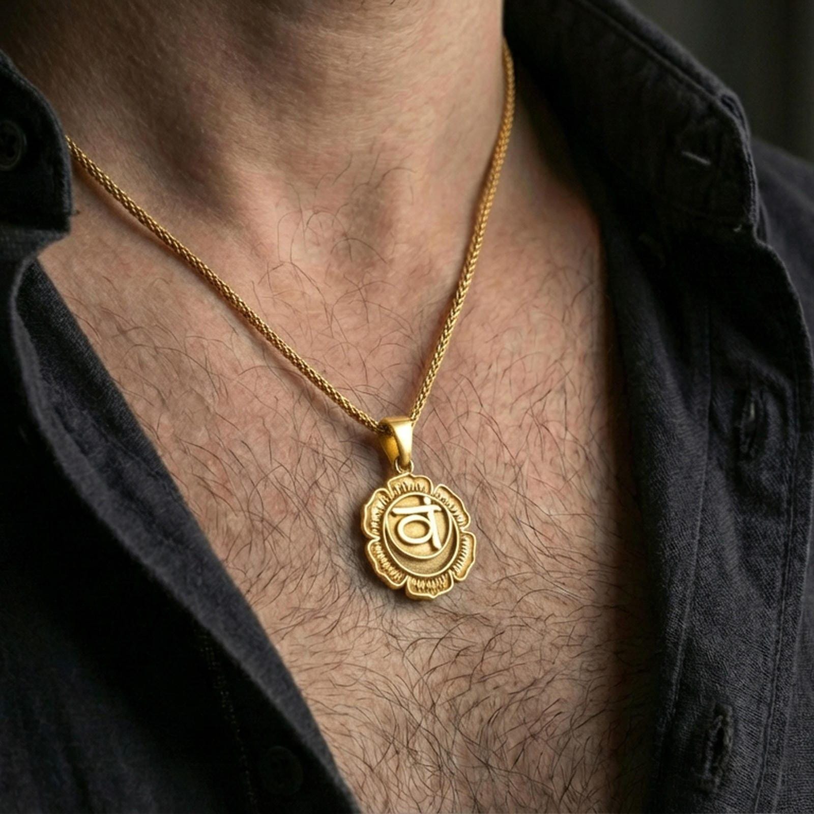 Gold plated throat chakra necklace with lotus motif worn on the neck in a premium lifestyle composition with elegant spiritual jewelry styling