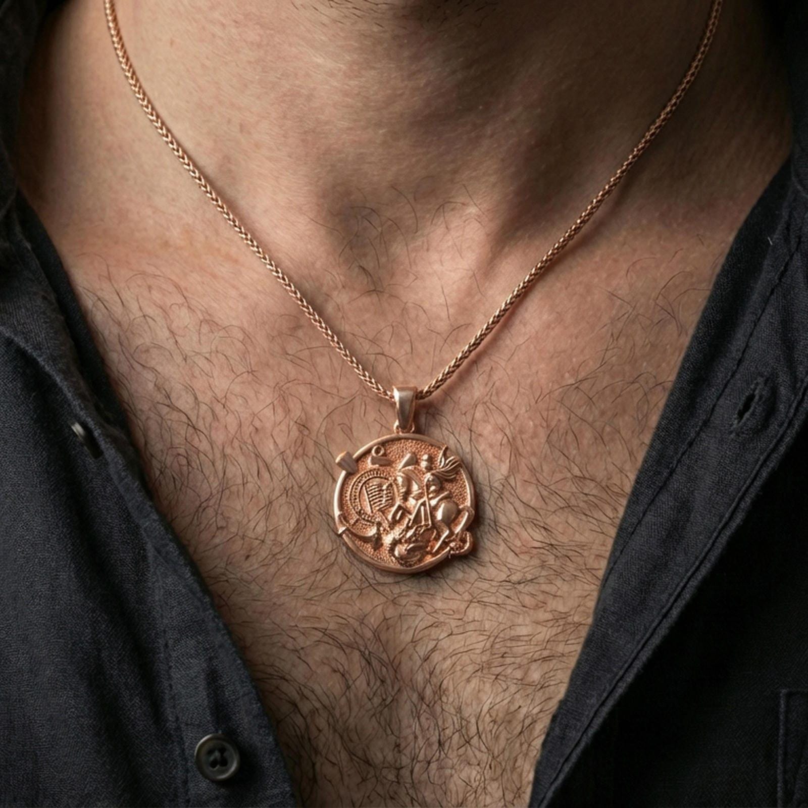 Rose gold plated Saint George dragon pendant worn on the neck in a refined lifestyle shot with a warm and powerful presentation