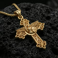 Load image into Gallery viewer, Gold plated Saint Michael pendant with winged protector figure, ornate cross silhouette, and engraved ornamental details showcased on black volcanic rock in a refined macro jewelry image

