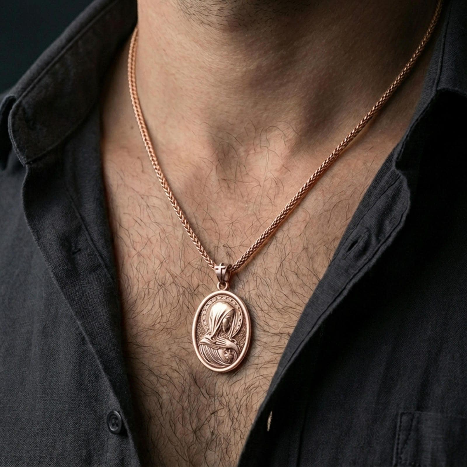 Rose gold plated Virgin Mary medallion with sacred heart and star halo worn on the neck in a refined lifestyle shot with a warm and elegant presentation