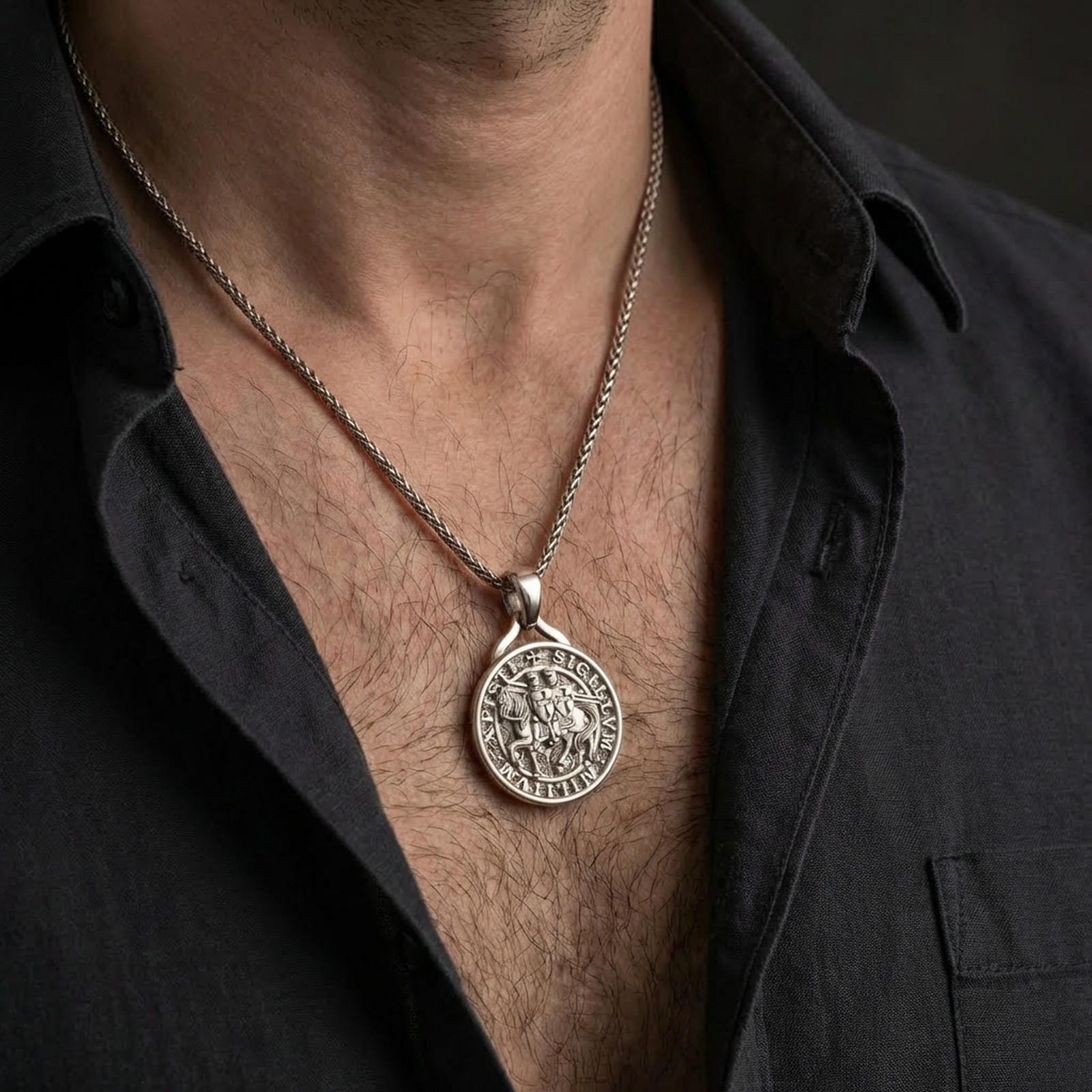 Polished silver Knights Templar seal pendant necklace worn on the neck, shown against the chest in a clean and elegant everyday wear composition.