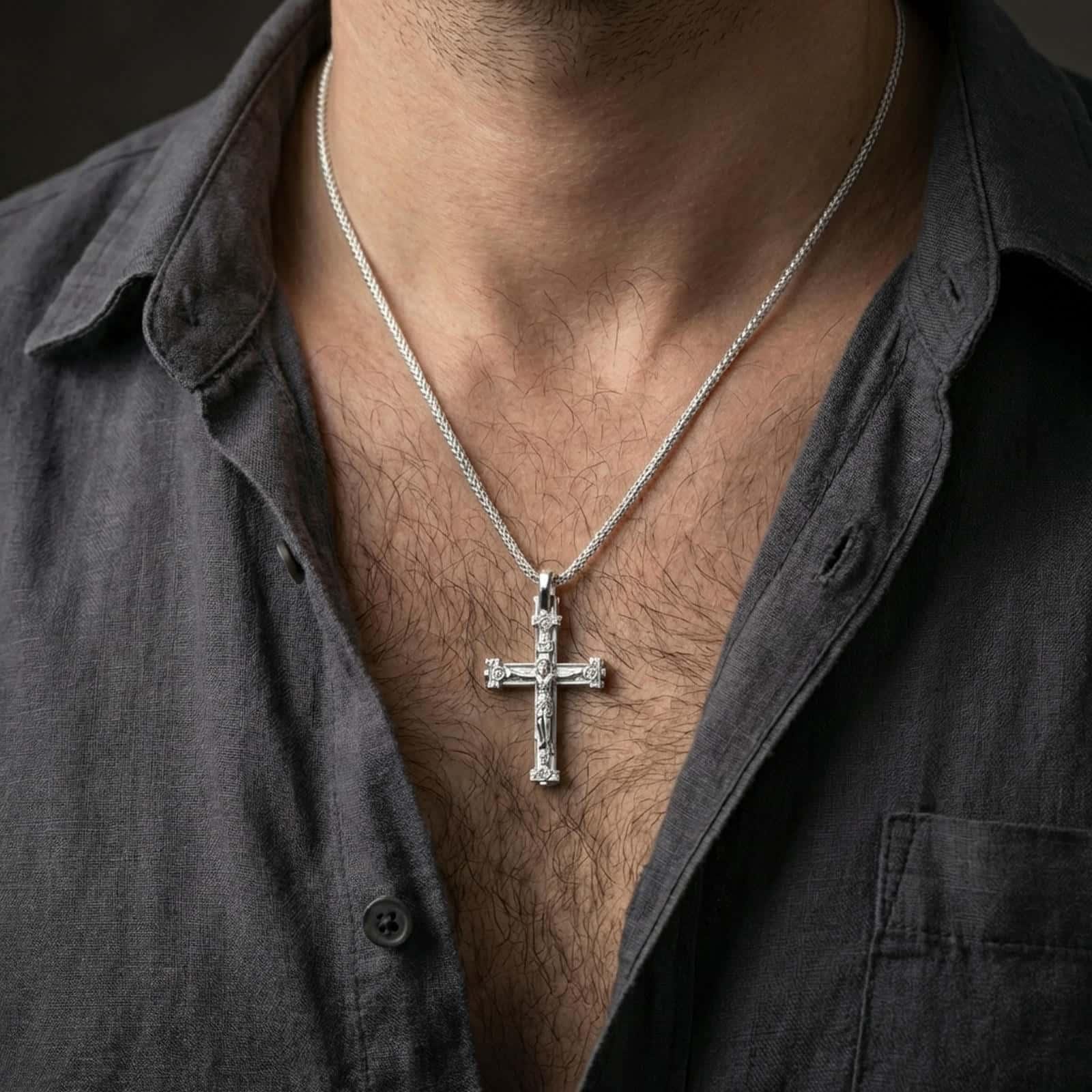 Polished silver Orthodox cross pendant necklace worn on the neck, shown against the chest in a clean and elegant everyday wear composition.