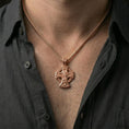 Load image into Gallery viewer, Rose gold plated Archangel Michael amulet with elaborate devotional cross design worn on the neck in a refined lifestyle shot with a warm and powerful presentation
