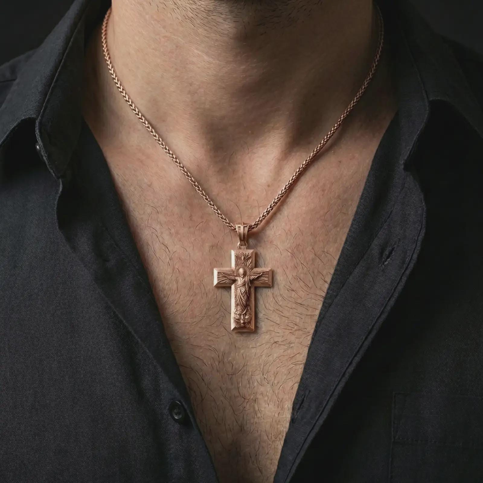 Rose gold plated Jesus Ascension cross pendant necklace worn on the neck, presented in a close-up lifestyle shot with a refined masculine aesthetic.