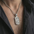 Load image into Gallery viewer, Polished silver Saint George dog tag pendant necklace worn on the neck, shown against the chest in a clean and elegant everyday wear composition.
