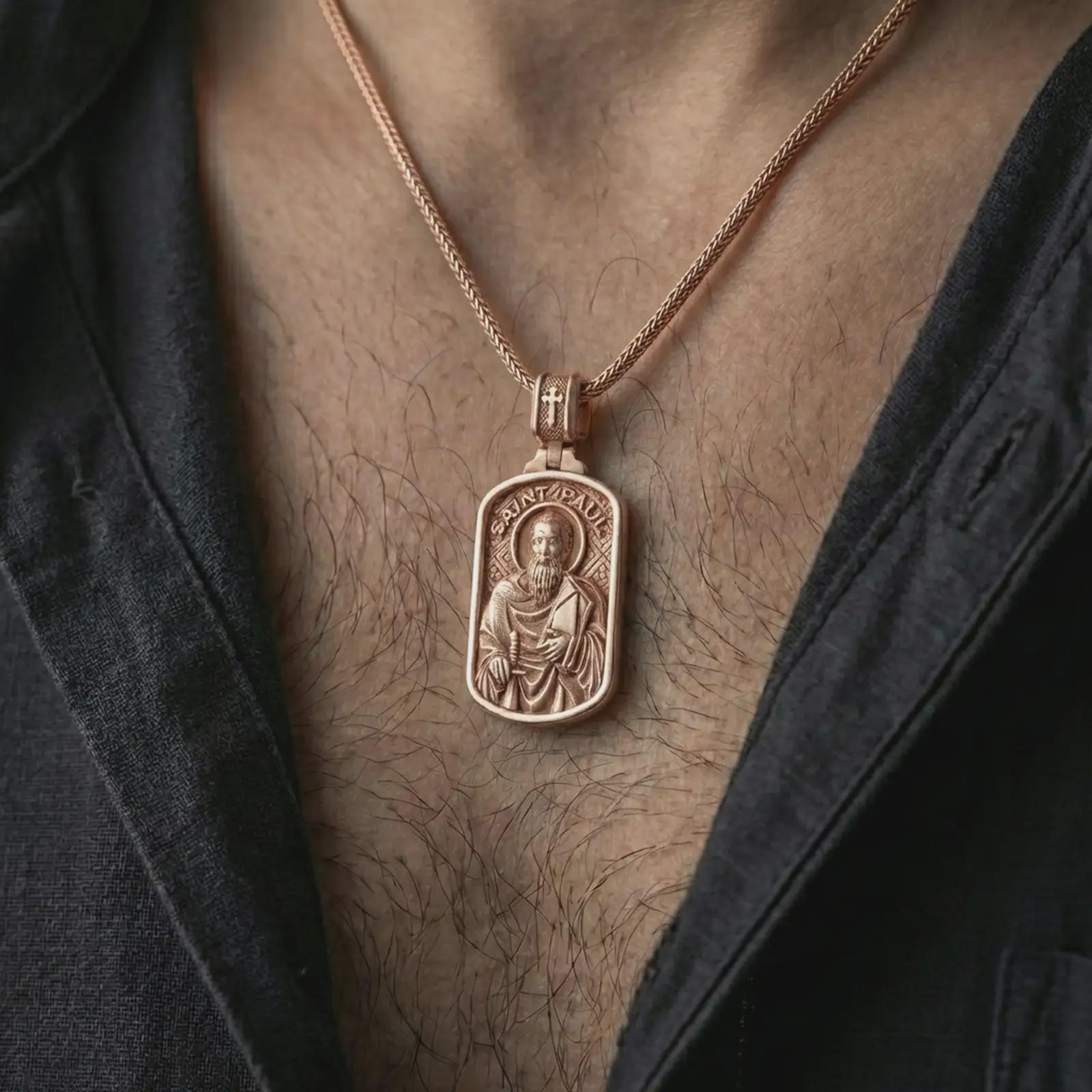 Rose gold plated Saint Paul dog tag pendant necklace worn on the neck, presented in a close-up lifestyle shot with a refined masculine aesthetic.