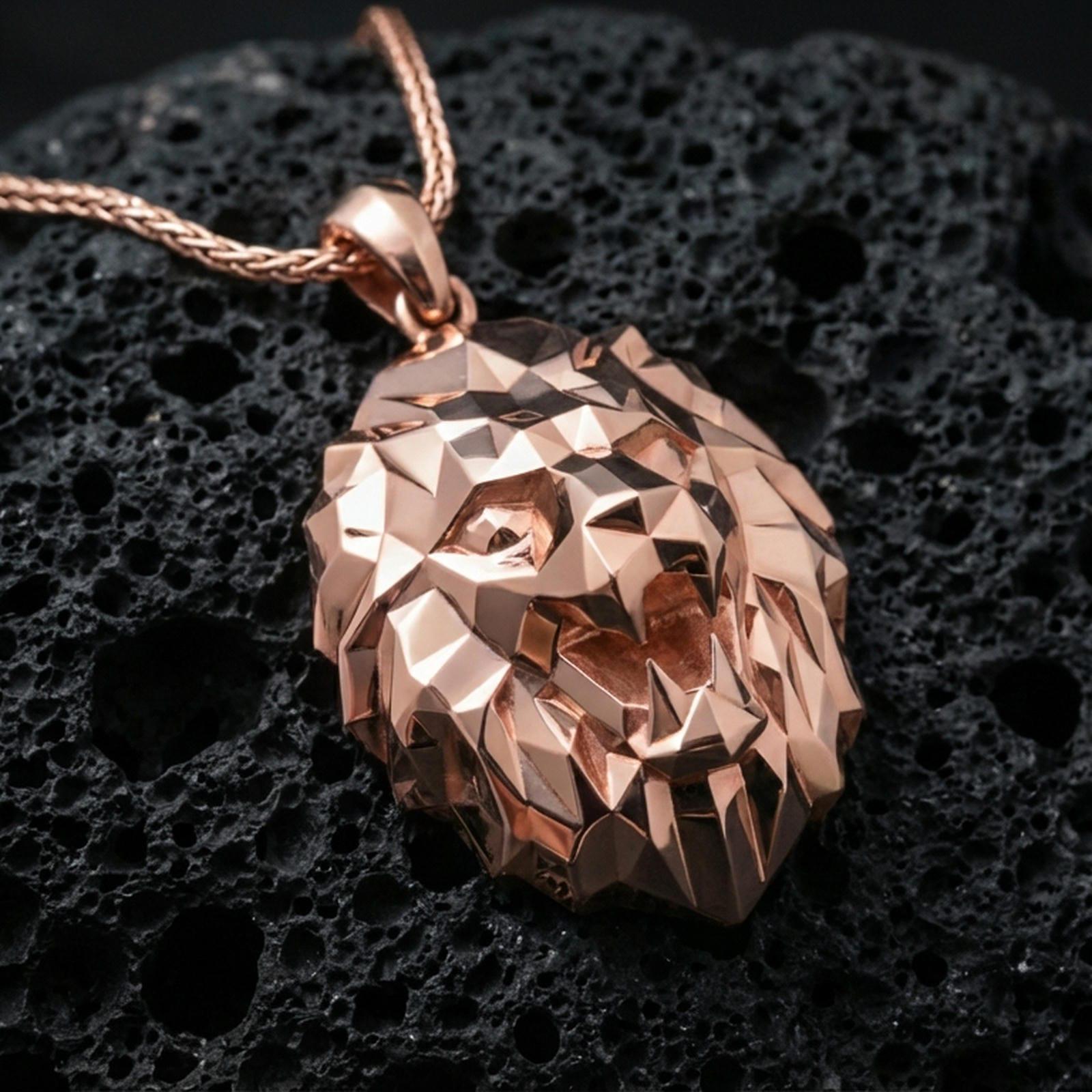 Rose gold plated geometric lion necklace with low poly lion face, sharp faceted planes, and modern wilderness-inspired design resting on volcanic rock in an elegant close-up product presentation