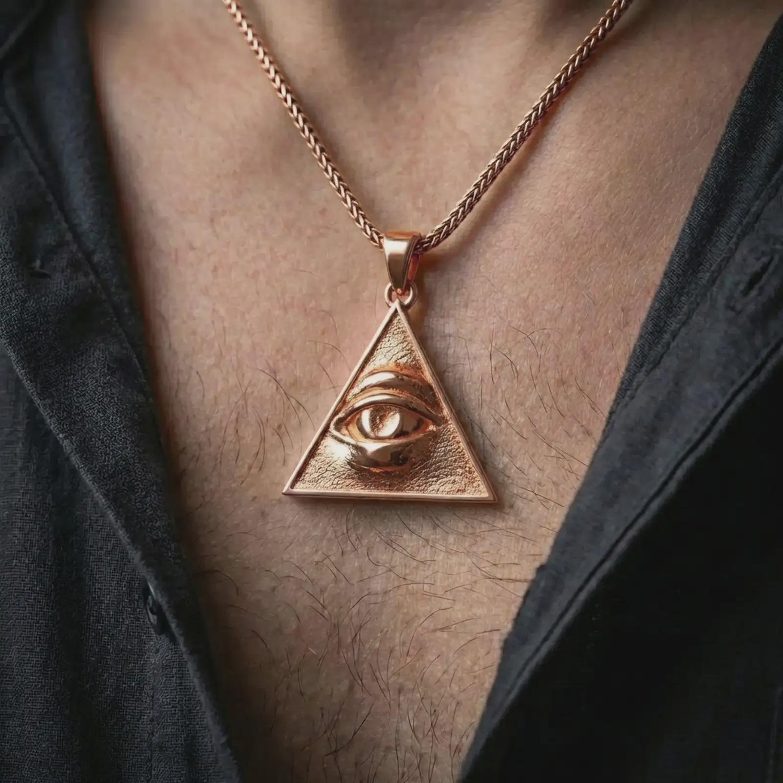 Rose gold plated all-seeing eye pendant necklace worn on the neck, presented in a close-up lifestyle shot with a refined masculine aesthetic.