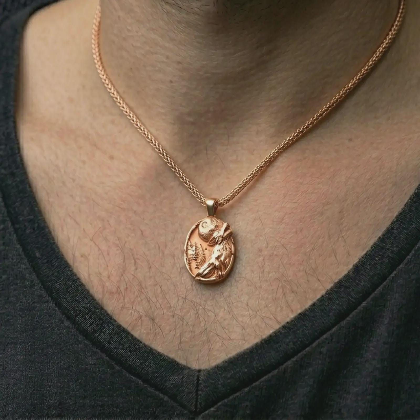 Rose gold plated howling wolf pendant necklace worn on the neck, presented in a close-up lifestyle shot with a refined masculine aesthetic.