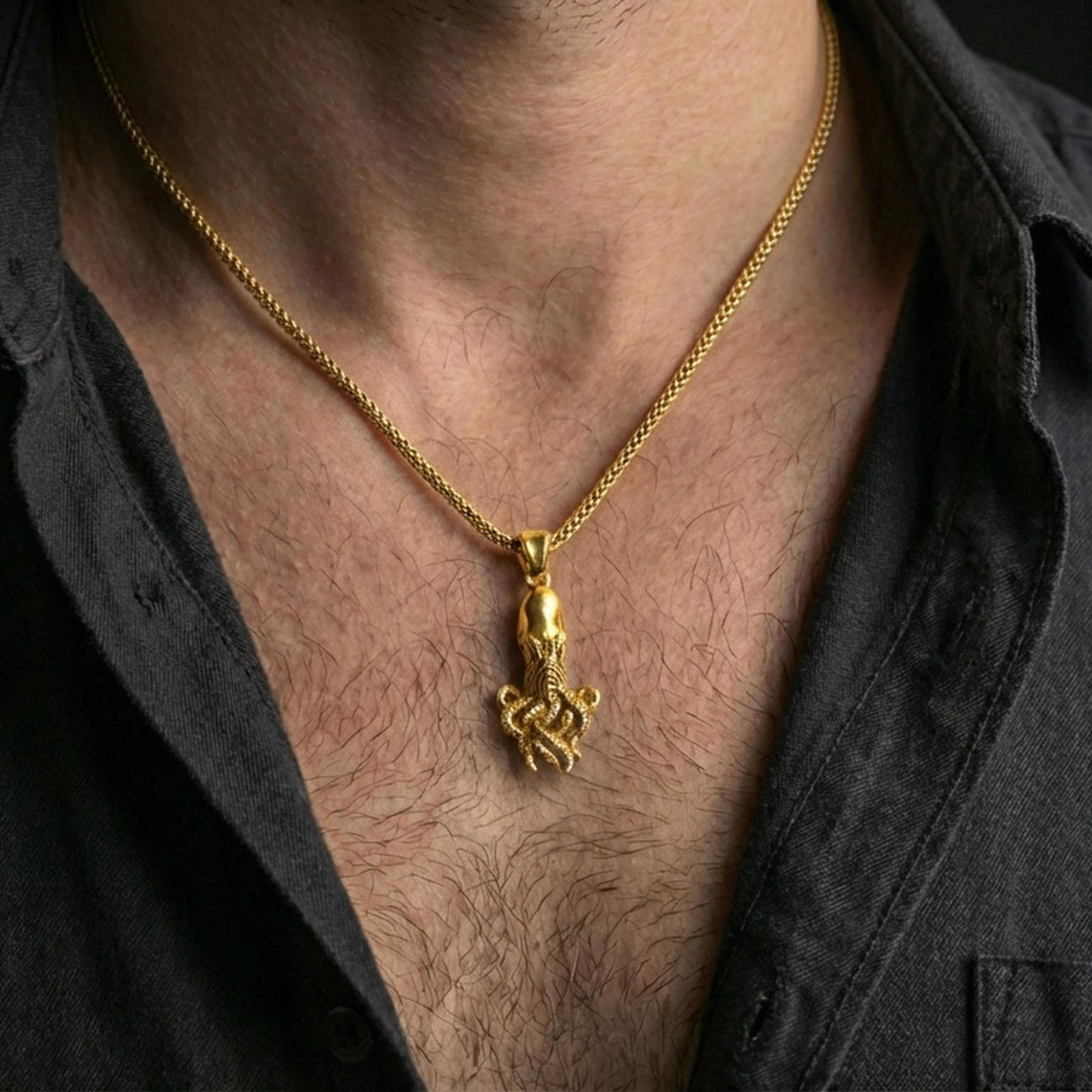Gold plated octopus pendant necklace worn on the neck, captured on a human model in a premium dark-toned lifestyle frame.