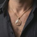 Load image into Gallery viewer, Rose gold plated Masonic emblem pendant necklace worn on the neck, presented in a close-up lifestyle shot with a refined masculine aesthetic.
