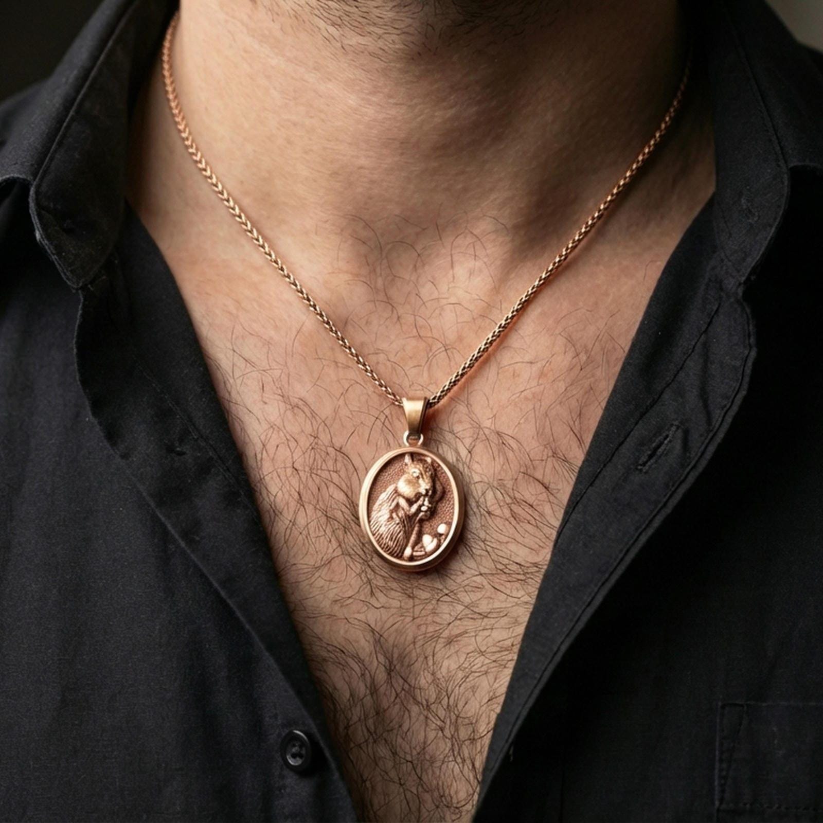 Rose gold plated squirrel pendant necklace worn on the neck, presented in a close-up lifestyle shot with a refined masculine aesthetic.