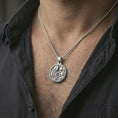 Load image into Gallery viewer, Polished silver Art Nouveau woman pendant necklace worn on the neck, shown against the chest in a clean and graceful everyday wear composition.
