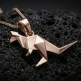 Load image into Gallery viewer, Rose gold plated origami kangaroo pendant necklace on dark volcanic rock, photographed in a detailed premium studio macro view.
