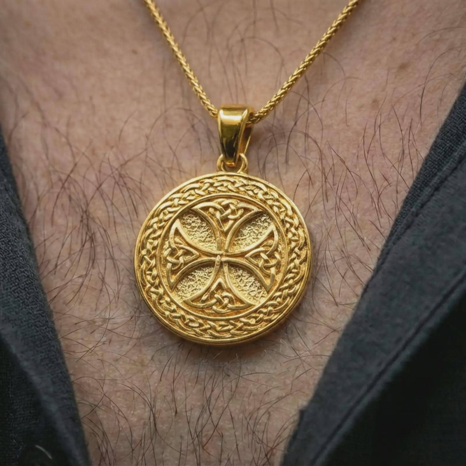 Gold plated Celtic knot medallion necklace worn on the neck, captured on a human model in a premium dark-toned lifestyle frame.