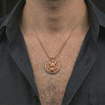 Load image into Gallery viewer, Rose gold plated samurai skull pendant necklace worn on the neck, presented in a close-up lifestyle shot with a refined masculine aesthetic.
