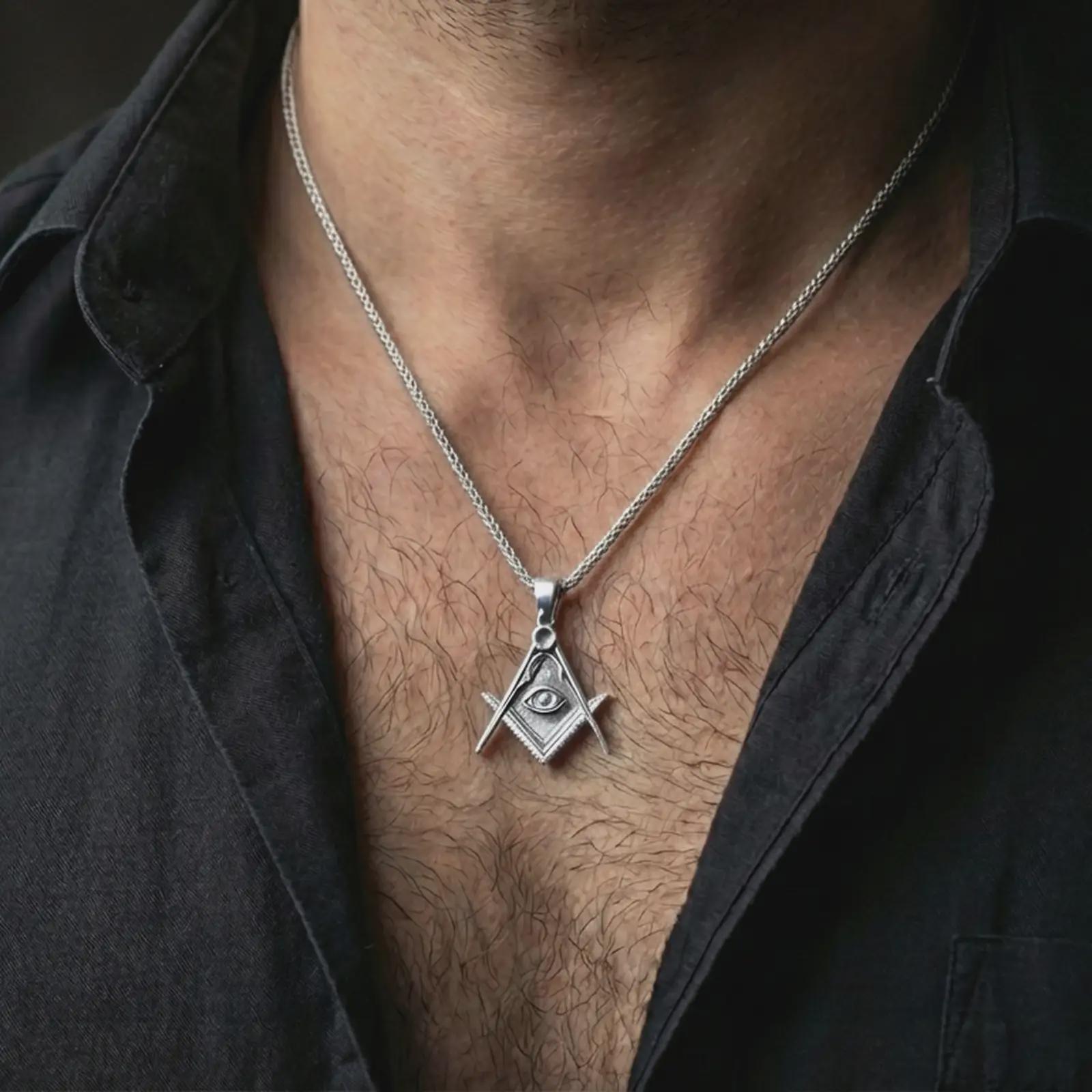 Polished silver Master Mason pendant necklace worn on the neck, shown against the chest in a clean and elegant everyday wear composition.