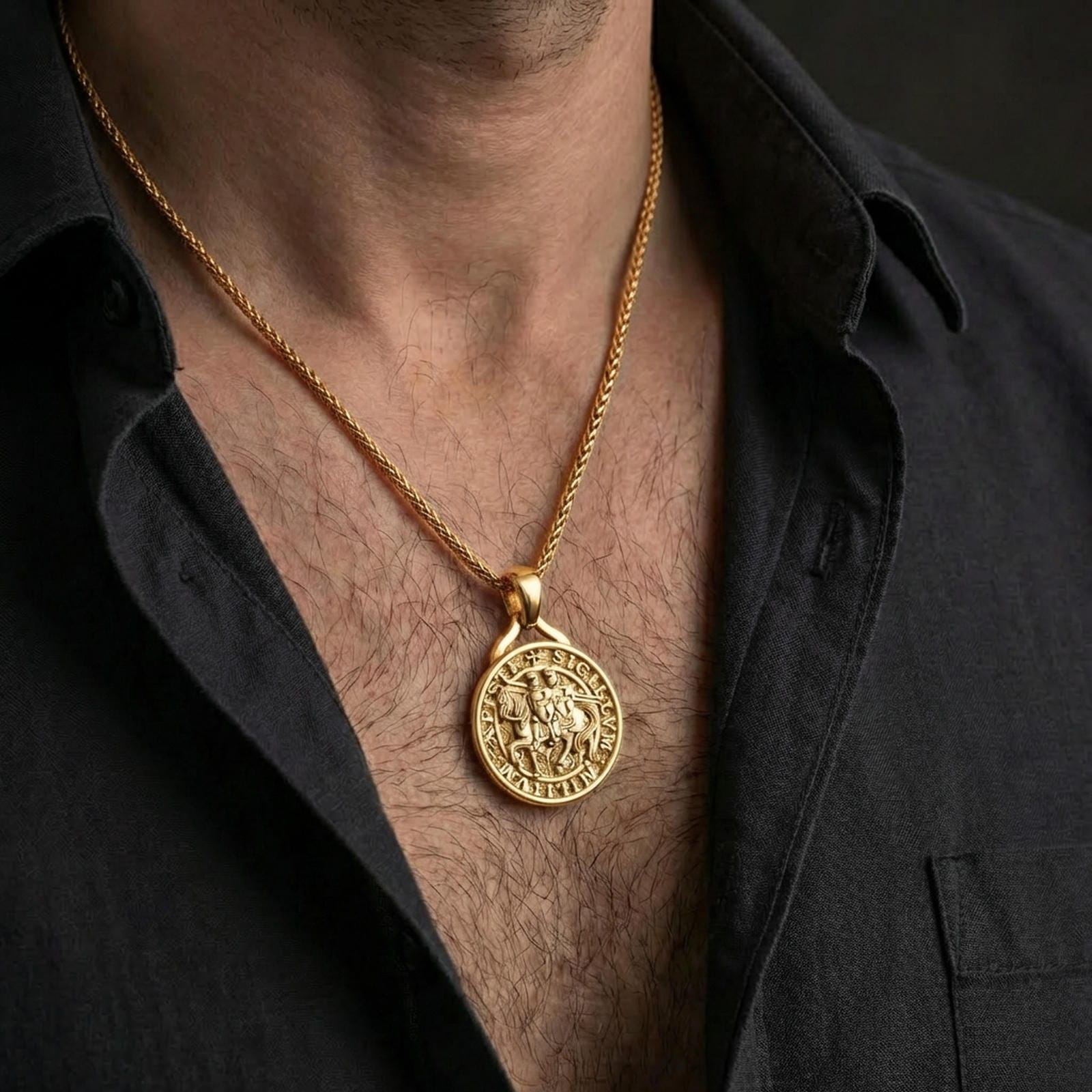 Gold plated Knights Templar seal pendant necklace worn on the neck, captured on a human model in a premium dark-toned lifestyle frame.