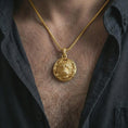 Load image into Gallery viewer, A gold plated tiger pendant worn on the neck, statement piece with luminous highlights on the tiger face and frame.
