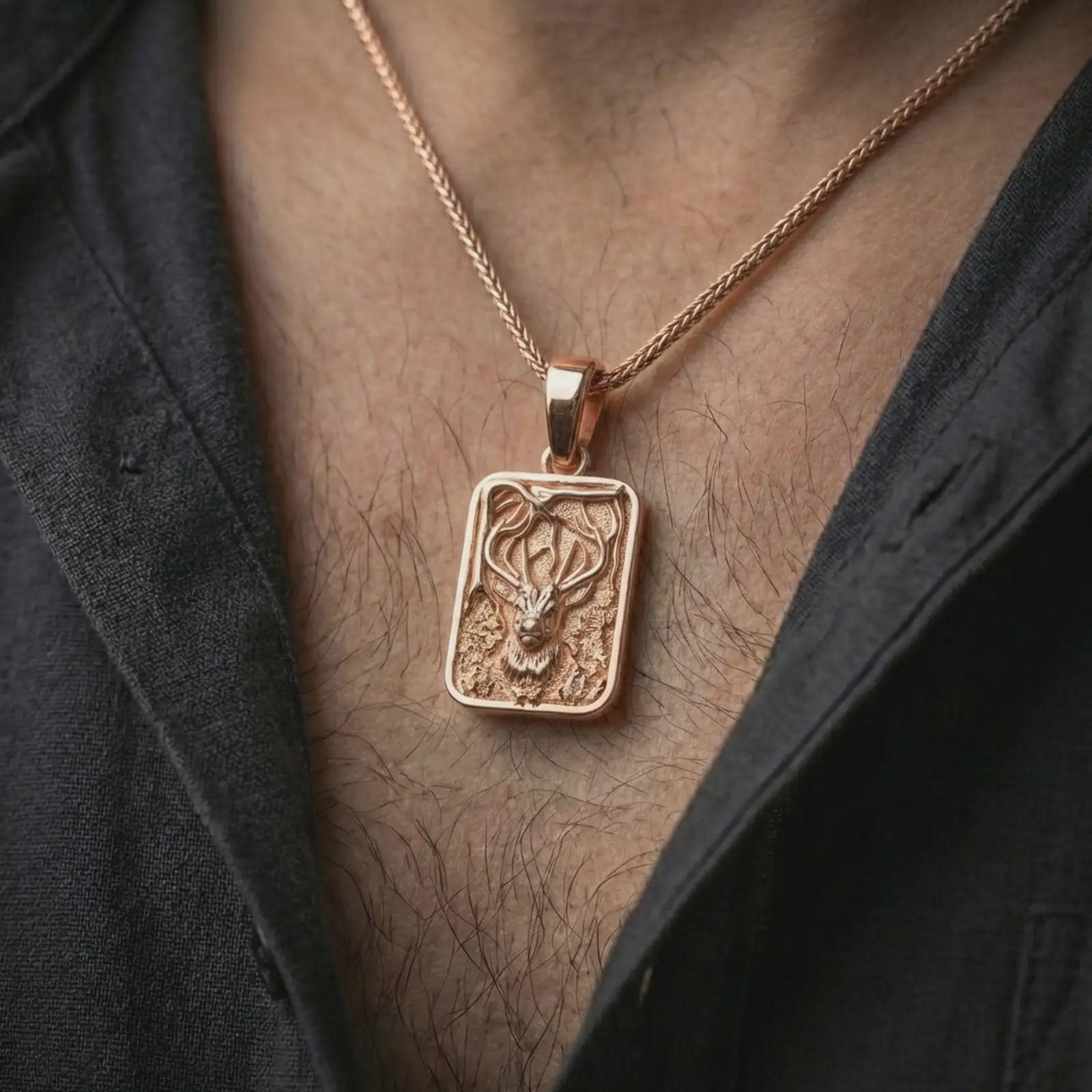 Rose gold plated stag forest pendant necklace worn on the neck, presented in a close-up lifestyle shot with a refined woodland aesthetic.