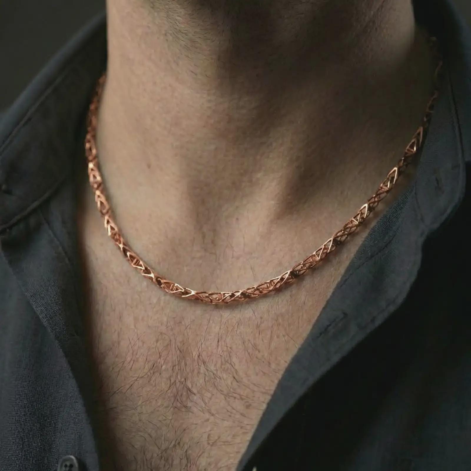 Rose gold plated DNA helix chain necklace worn on the neck, presented in a close-up lifestyle shot with a refined science-inspired aesthetic.