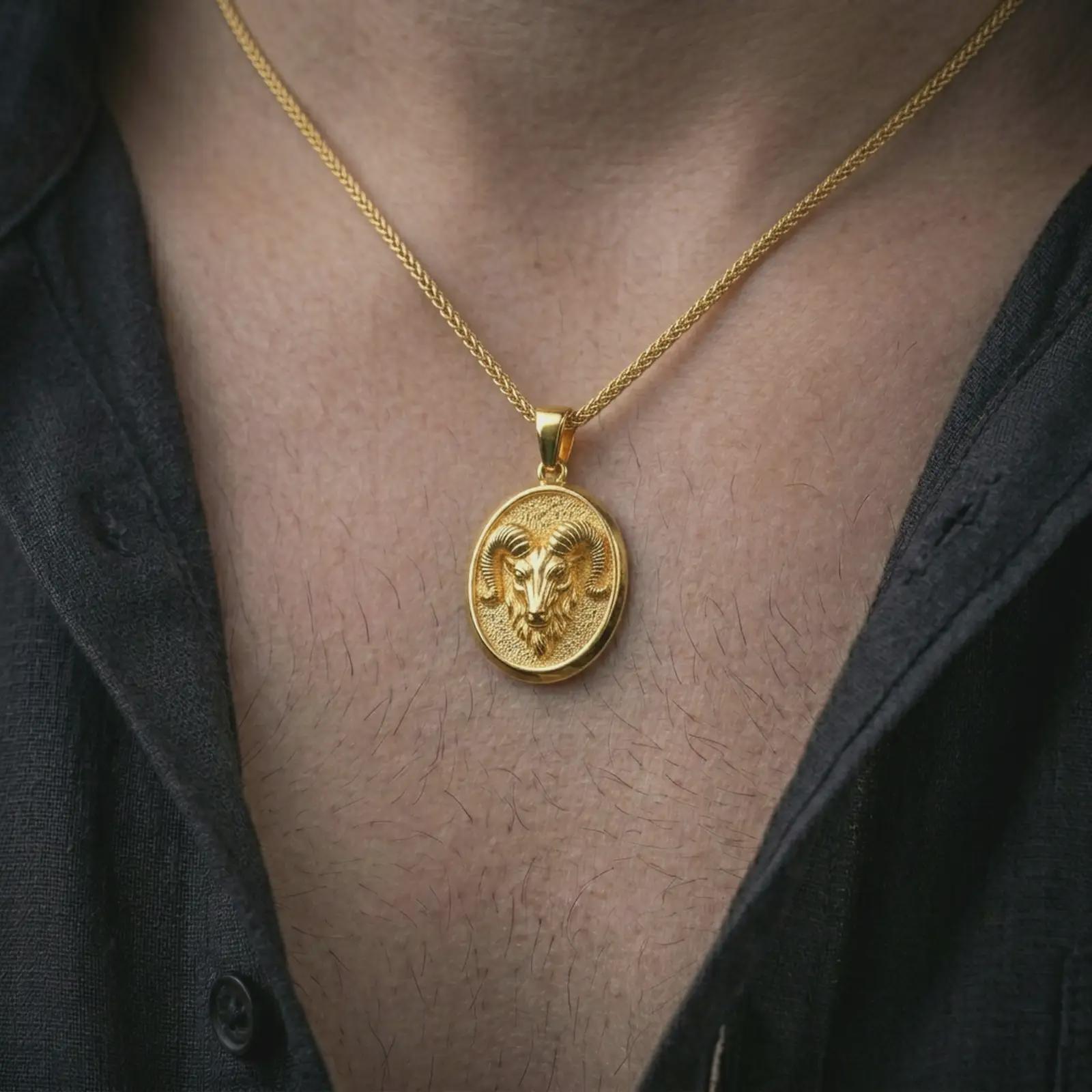 Gold plated ram head pendant necklace worn on the neck, captured on a human model in a premium dark-toned lifestyle frame.