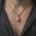 Load image into Gallery viewer, Rose gold plated 3D lioness pendant necklace worn on the neck, presented in a close-up lifestyle shot with a refined safari-inspired aesthetic.
