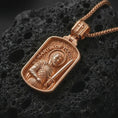 Load image into Gallery viewer, Rose gold plated Saint Martin of Tours pendant necklace on dark volcanic rock, photographed in a detailed premium studio macro view.
