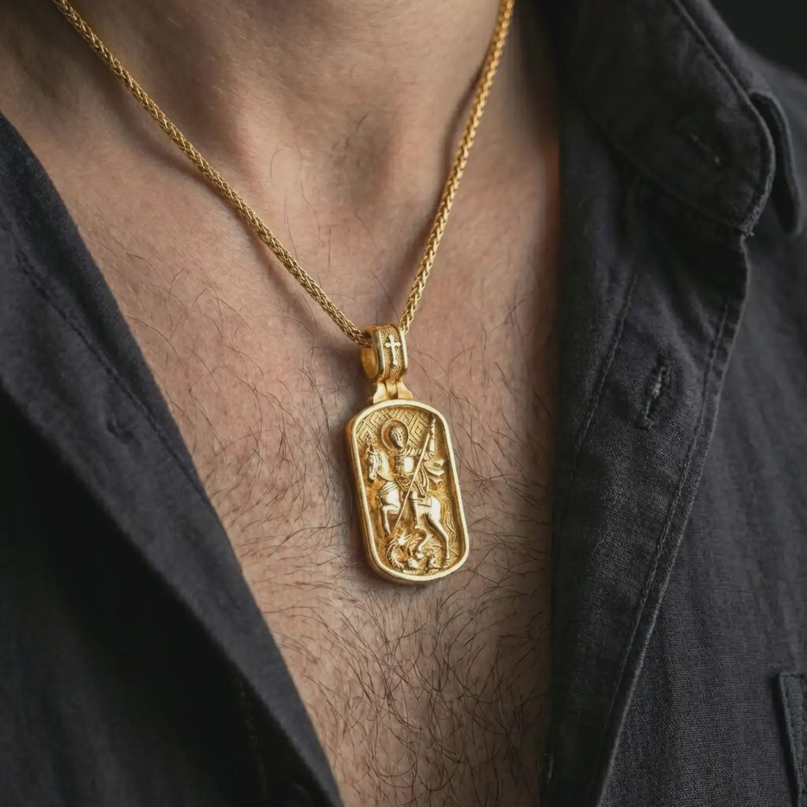 Gold plated Saint George dog tag pendant necklace worn on the neck, captured on a human model in a premium dark-toned lifestyle frame.