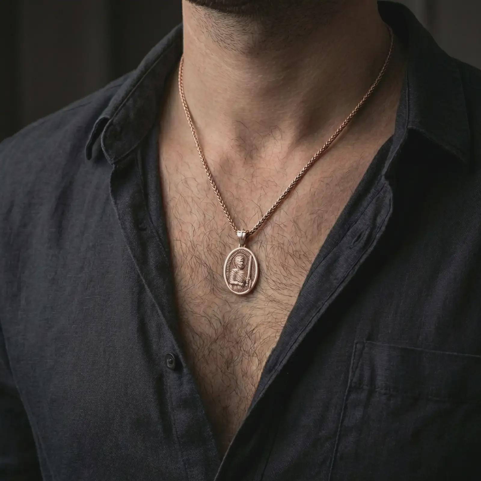 Rose gold plated Saint Martin of Tours pendant necklace worn on the neck, presented in a close-up lifestyle shot with a refined masculine aesthetic.