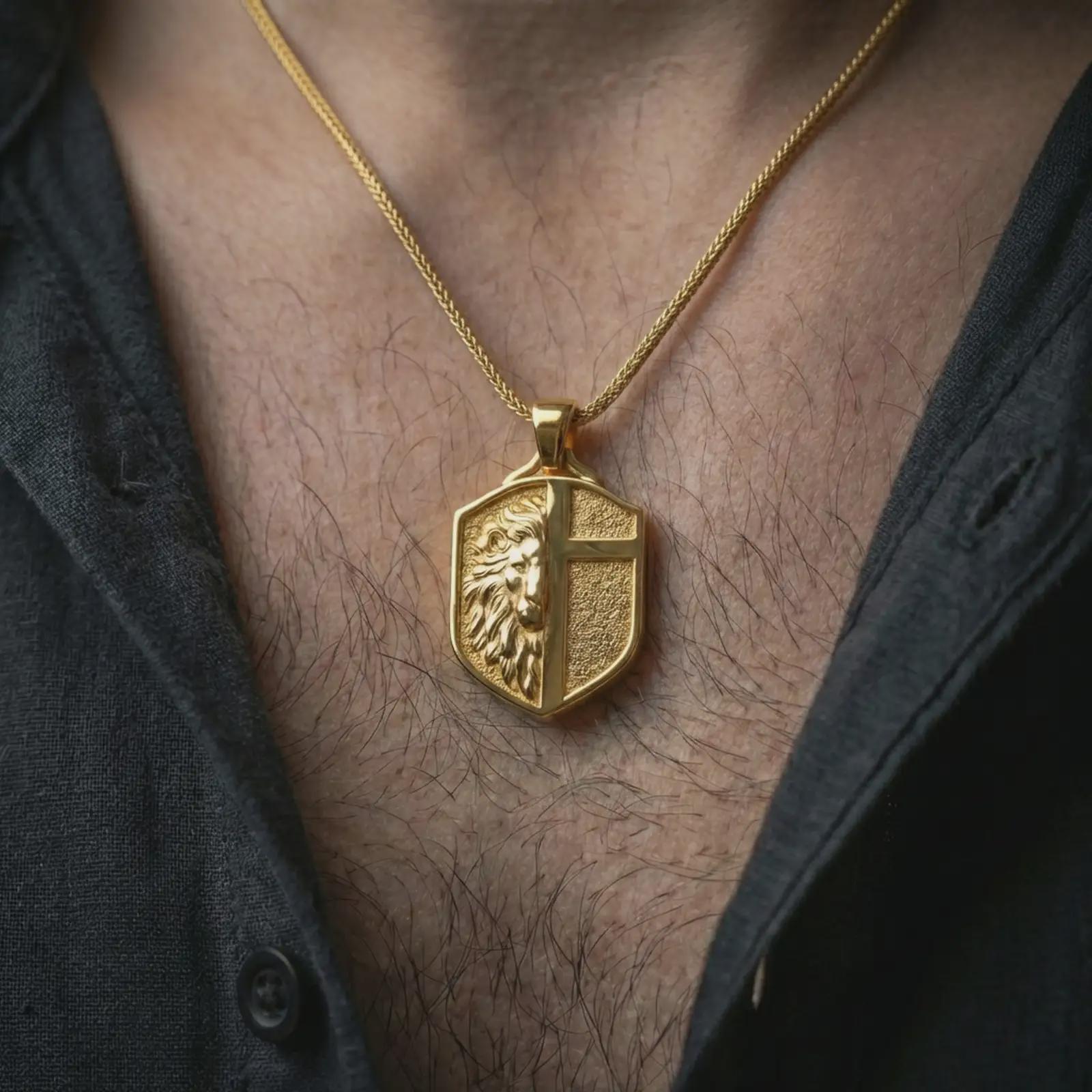 A gold plated lion cross pendant worn on the neck, faith-inspired shield jewelry with masculine statement look.