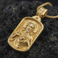 Load image into Gallery viewer, Gold plated Sacred Heart pendant necklace presented on porous volcanic rock, highlighting the rectangular devotional form in a luxurious close-up jewelry image.
