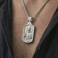 Load image into Gallery viewer, Polished silver Sacred Heart pendant necklace worn on the neck, shown against the chest in a clean and elegant everyday wear composition.
