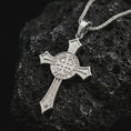 Load image into Gallery viewer, Polished silver Knights Templar cross pendant necklace displayed on black volcanic stone, shown in a premium macro product shot highlighting the medieval crusader cross silhouette and engraved circular seal.
