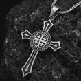 Load image into Gallery viewer, Sterling silver Knights Templar cross pendant necklace with an oxidized finish resting on textured volcanic rock, captured in a close-up studio image with the Sigillum Militum Xpisti seal at the center.
