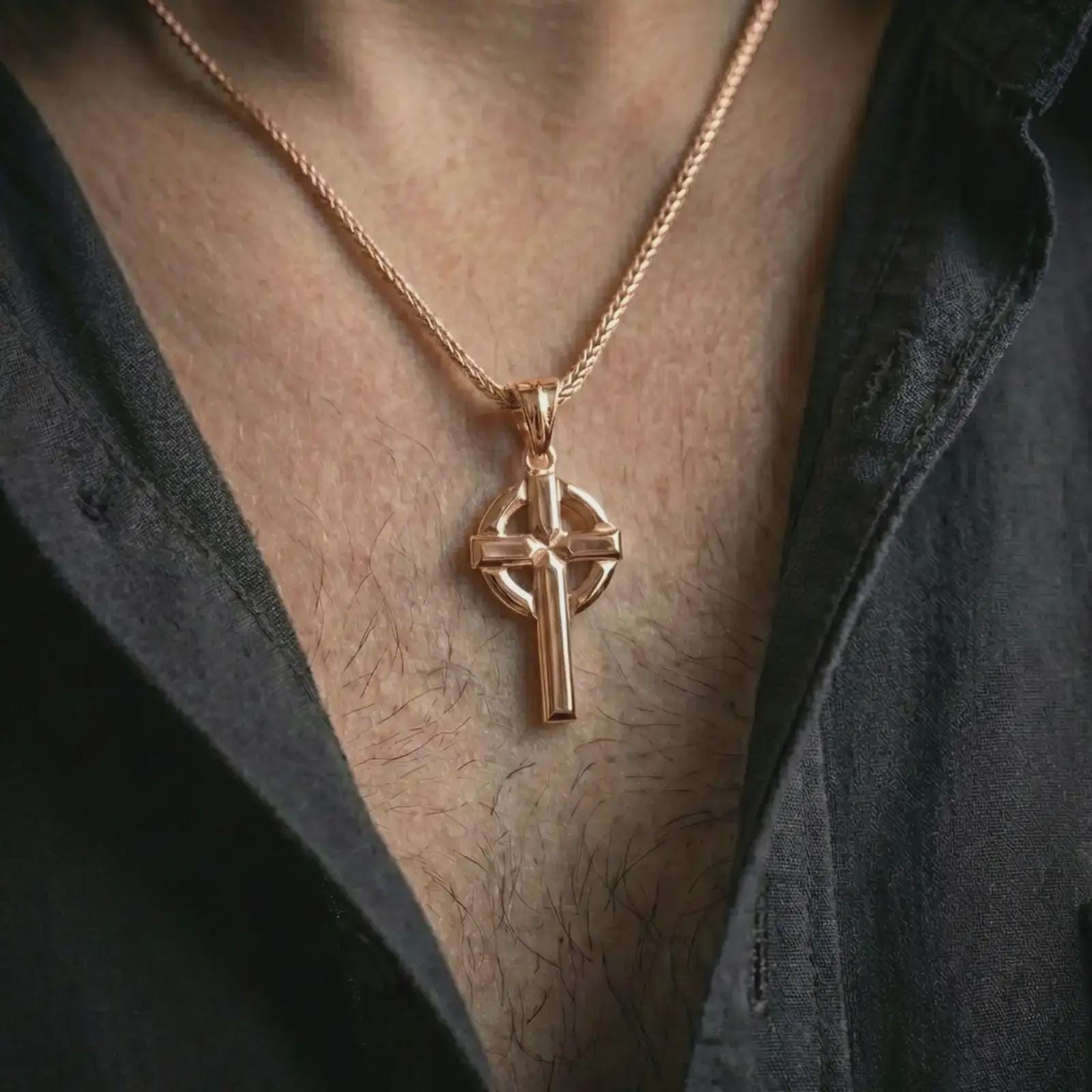 Rose gold plated Celtic cross pendant necklace worn on the neck, shown in a refined model photograph with an elegant Christian and Irish heritage inspired look.