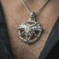 Load image into Gallery viewer, Polished silver bad dream catcher pendant necklace worn on the neck, shown against the chest in a clean and dramatic everyday wear composition.
