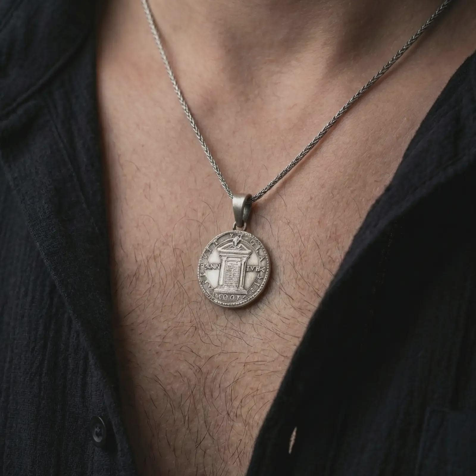 Oxidized Pope Innocent coin pendant necklace worn on the neck, styled in a dark lifestyle image that presents the antique papal medal as a bold historical and spiritual statement piece.